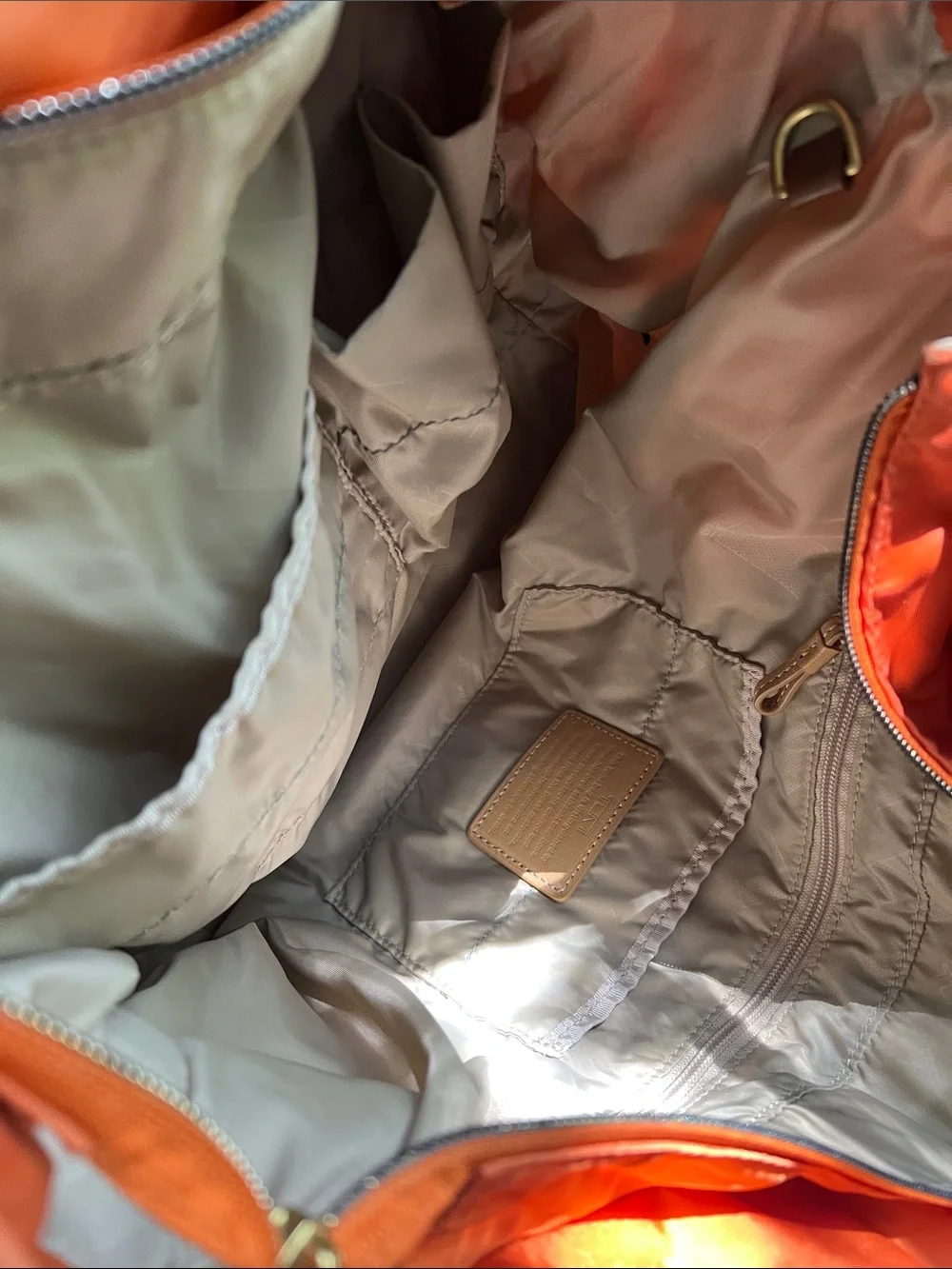 Tumi Orange Nylon Tote with Tan Leather Handles. Pre owned.